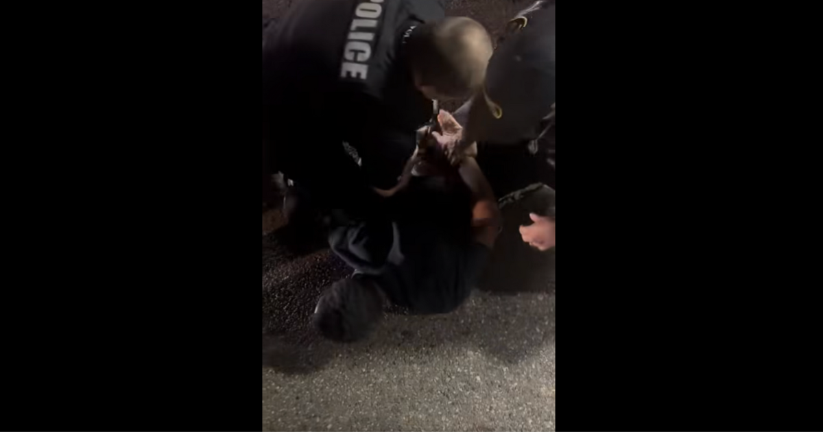 video screenshot of DB Deron Maxwell being detained